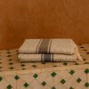 fouta artisanale, serviette hammam marocain, fouta coton, linge de bain marocain, fouta plage.
